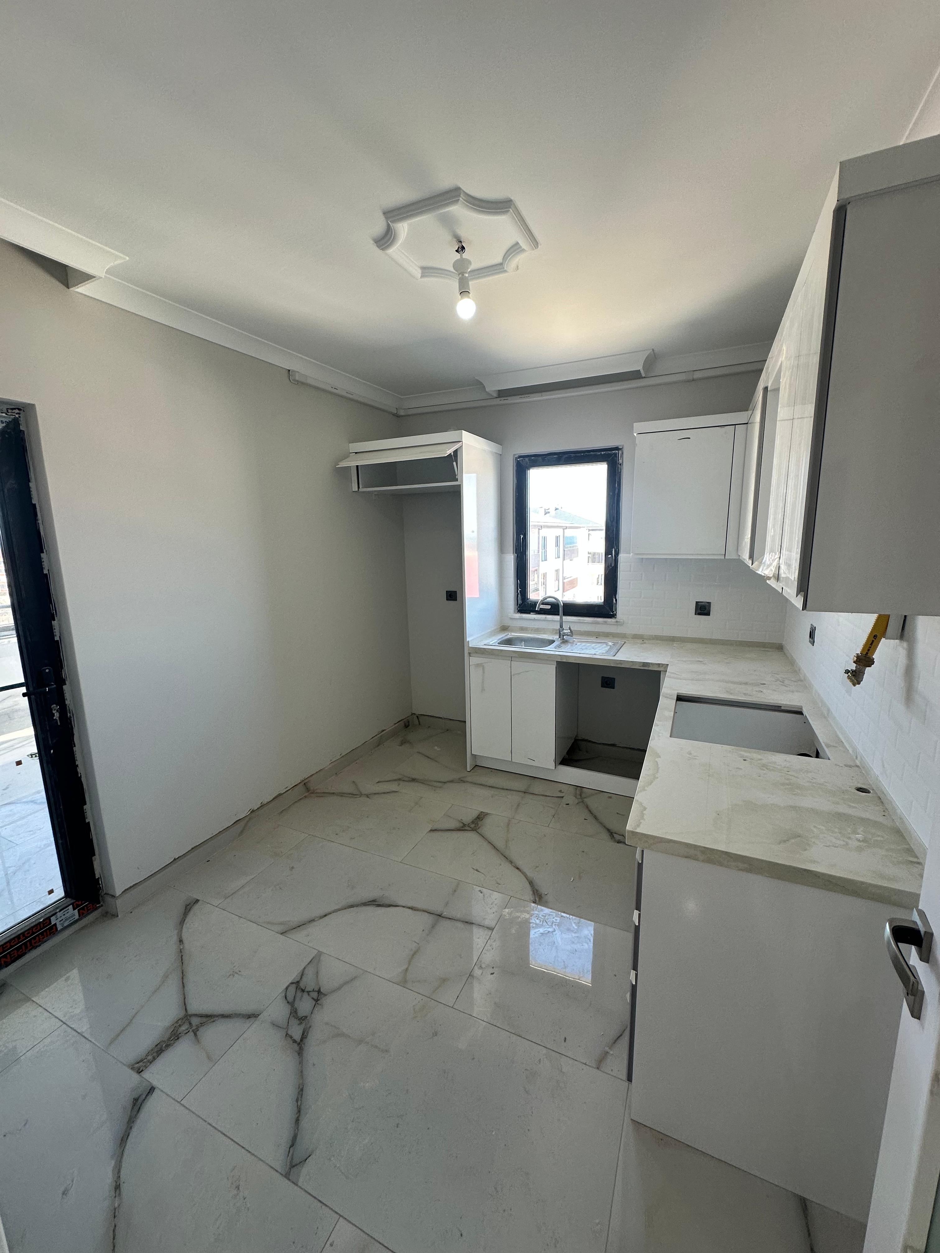 MABEL'DEN ARSİN FATİH MAHALLESİNDE DENİZ MANZARALI SATILIK DAİRE