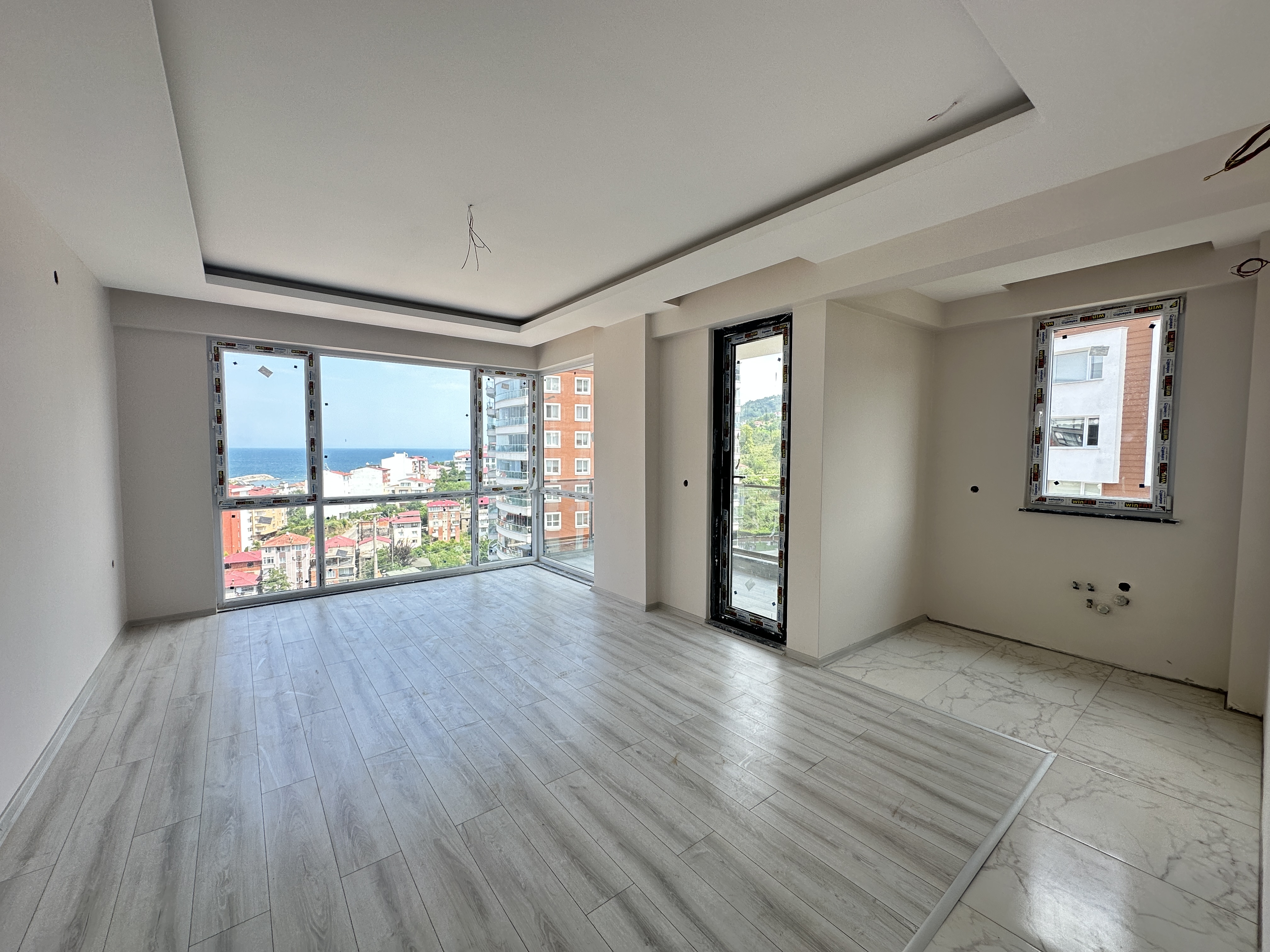 MABELGAYRİMENKUL-İSMETPAŞAMH MERKEZE YAKIN DENİZ MANZARALI DAİRE