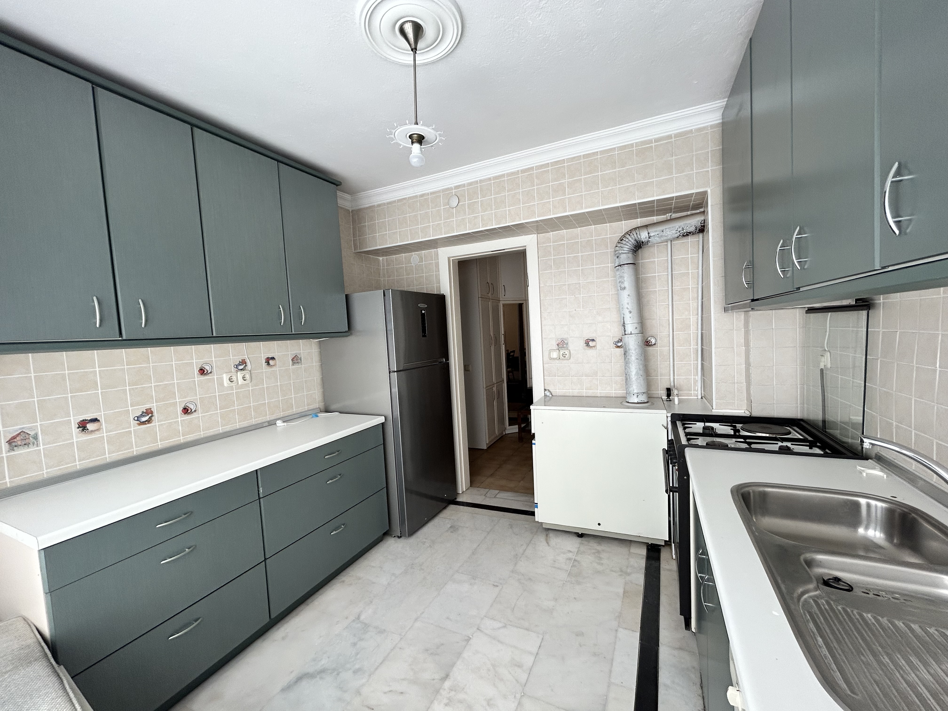 MARMARİS KAPALI ÇARŞIDA SATILIK 2+1 KAPALI MUTFAK DAİRE