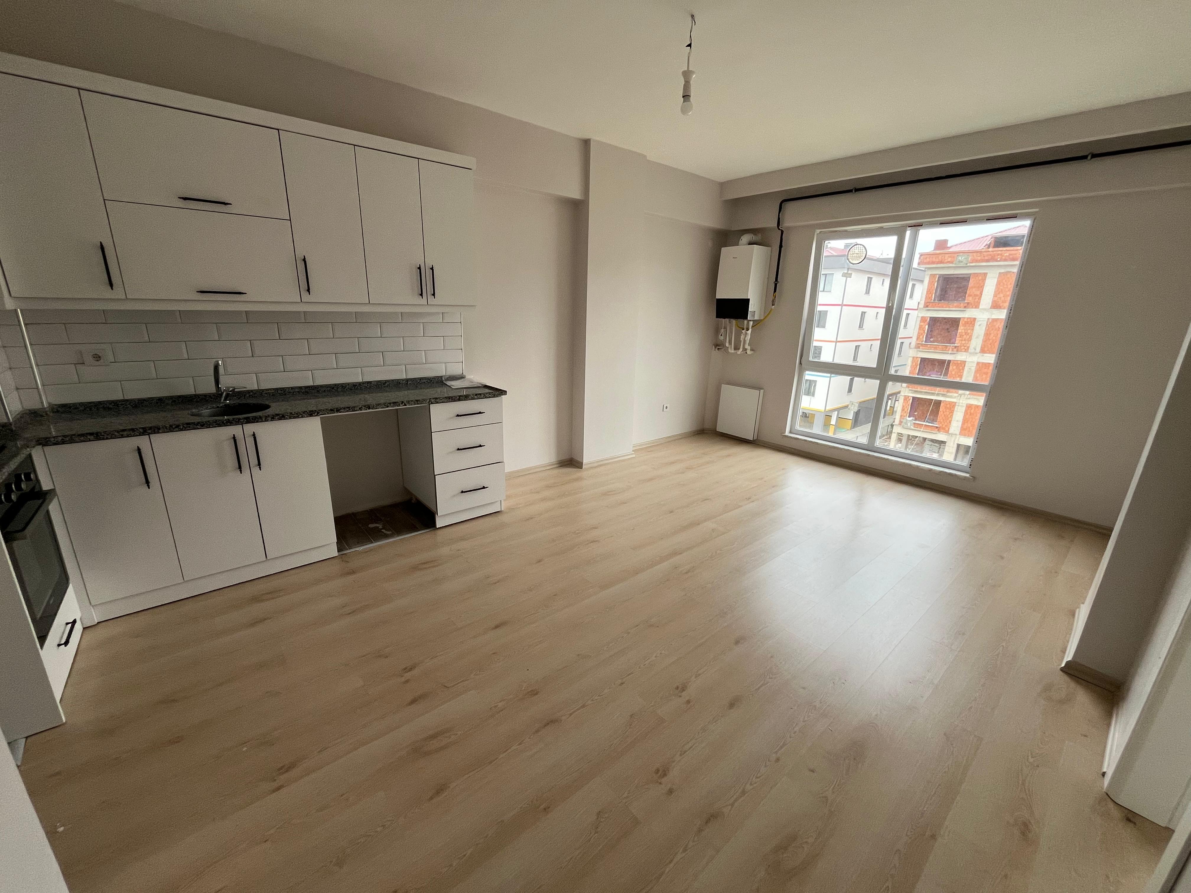 CUMHURİYET MAHALLESİ E-BEBEK KARŞISI SATILIK 1+1 DAİRE